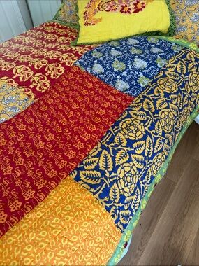 Anthropologie twin patchwork reversible quilt set. 4 pieces. Discontinued set.